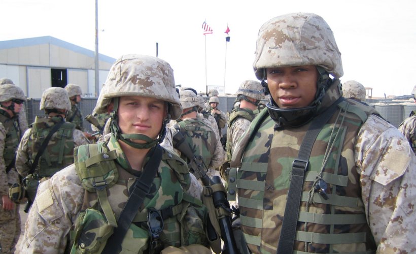 Bullock, right, with a fellow Marine in Iraq. (contributed)