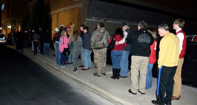 Fans wait in line outside of Academy Sports in Hoover. (Solomon Crenshaw Jr./Alabama NewsCenter)