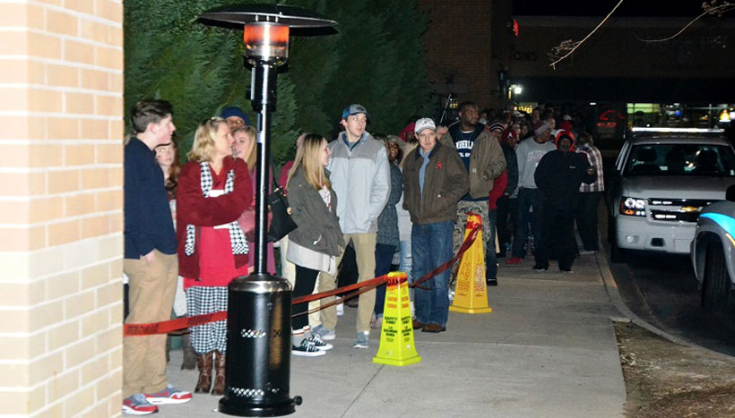 Fans wait in line outside of Academy Sports in Hoover. (Solomon Crenshaw Jr./Alabama NewsCenter)