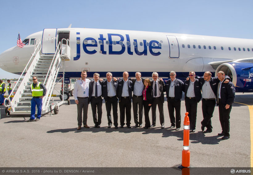 The flight crew of the JetBlue A321 pose for a picture after completing the plane’s initial flight test. (Image: Airwind via Airbus)