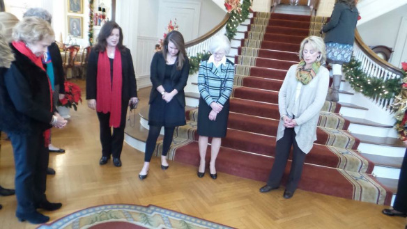 Dianne Bentley and guests at the Governor's Mansion bow their heads in prayer. (Photo: Murial Farley)