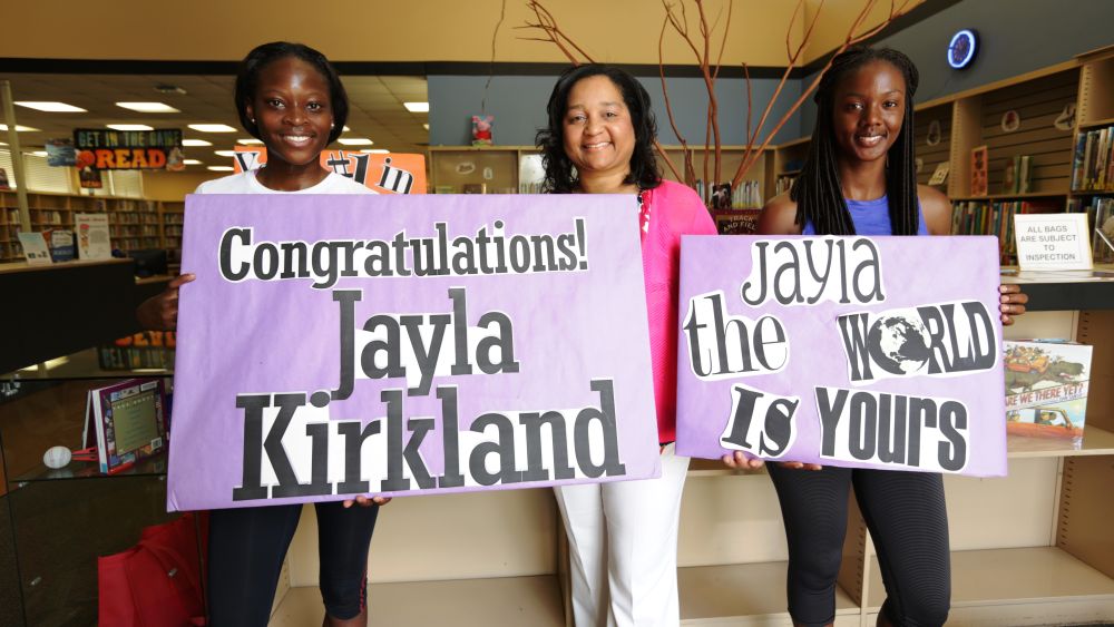 Jayla Kirkland (left) is joined by her coach Myra Hawkins (far right)