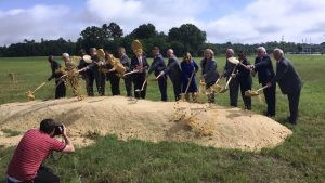 Officials move dirt at the Gerhardi groundbreaking ceremony. (Image: Alabama NewsCenter)