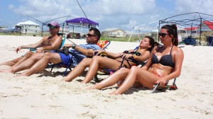 John Kemper of Fairhope, Mike Robichaux and Ali Robichaux of Ruston, La. and Trinity Stanley of Homer, La. relax at Fort Morgan. Tourists have come back in record numbers since the 2010 oil spill. (Robert DeWitt/Alabama NewsCenter)