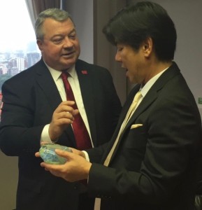 During a visit to Honda’s headquarters in Tokyo, Commerce Sec. Greg Canfield presented a glass sculpture from Alabama’s Orbix Hot Glass as a gift.