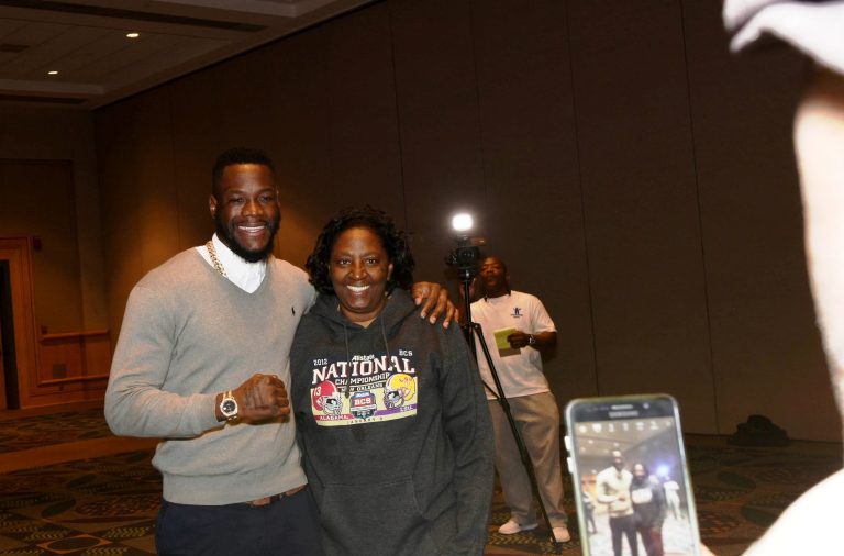 Deontay Wilder poses with a fan. (Solomon Crenshaw Jr. / Alabama NewsCenter)